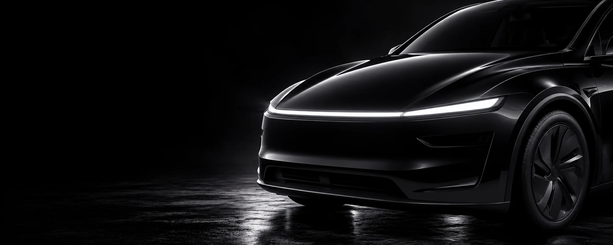 Vizualizace černé Tesly Model Y s výraznou přední LED linkou